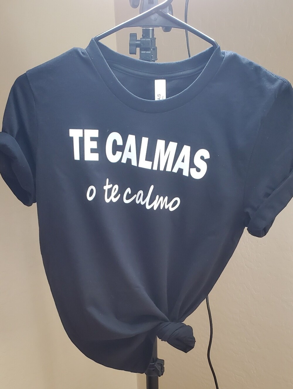 Bella Canvas Black Tee with White "TE CALMAS" Graphic